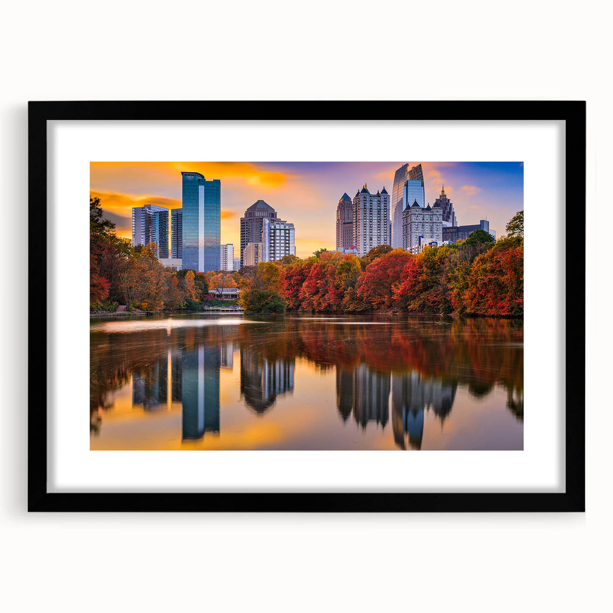 Colorful abstract art print of the Atlanta skyline, featuring vibrant hues on a large framed canvas.