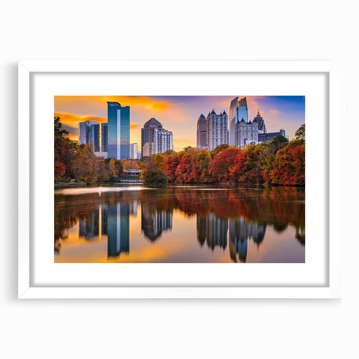 Abstract art print of Atlanta skyline in muted gray and blue tones on a framed white mat, ideal for dining room decor.