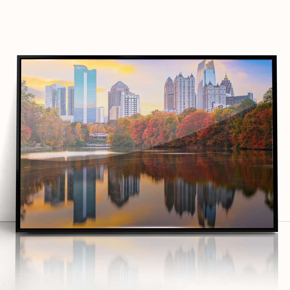 Large abstract wall art of Atlanta skyline in muted gray and blue tones on framed acrylic.
