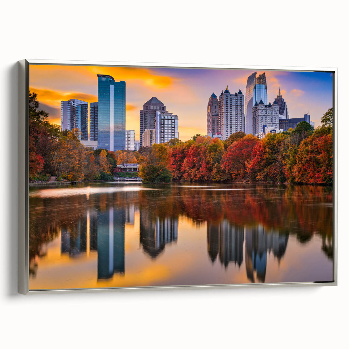 Framed canvas of Atlanta skyline in vintage poster style with black and colorful hues, ideal for office wall decor.
