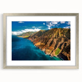 Textured art depicting an abstract Kauai landscape in muted earth tones, framed in silver, ideal for bedroom art.