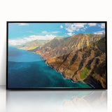 Large abstract wall art depicting Kauai's lush landscapes in vibrant greens and blues on a black framed acrylic.