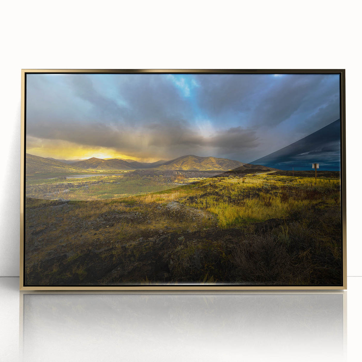 Large art print of Idaho scenery in gold tones on framed acrylic, reflecting mid-century modernist style.