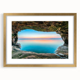 Extra large abstract art print of Lake Michigan with textured waves in muted blue tones, framed in gold.