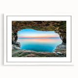 Abstract art print of Lake Michigan, using muted blue and gray tones on a white framed canvas.