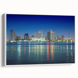 Vintage poster art of New Orleans street scene in vibrant colors on a large framed canvas, ideal for living room decor.