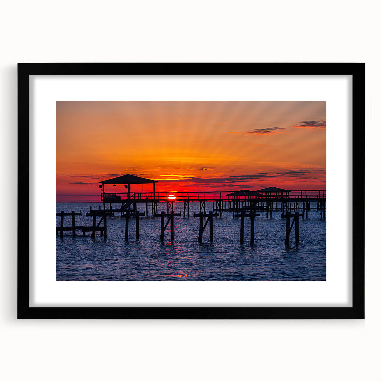 Colorful abstract art print of Louisiana scenery in vibrant hues on a large textured canvas, framed in black.