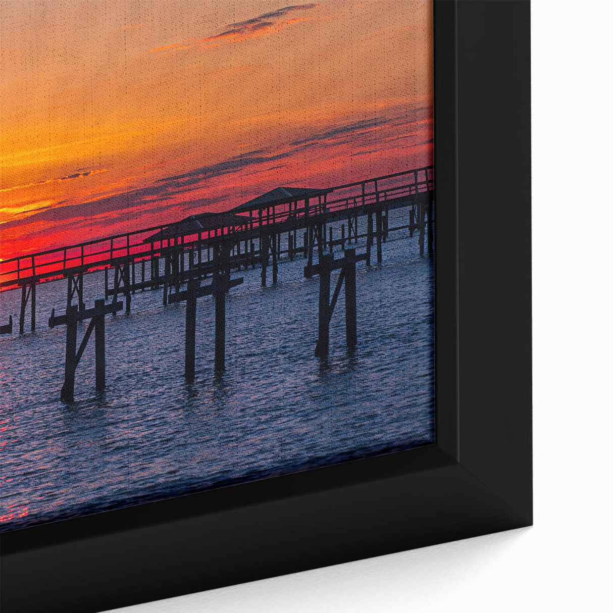 Black wall art featuring a textured Louisiana landscape on a framed canvas, with colorful art accents.