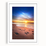 Abstract art print of Maine scenery in soft blue and green tones, framed in white, suitable for dining room decor.