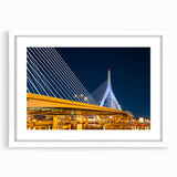 Abstract art print of Boston skyline in muted blue and gray tones on a framed white mat, suitable for dining room decor.