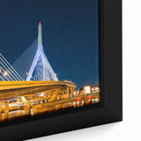 Close-up of a textured black wall art depicting the Boston skyline with vibrant, colorful accents on a framed canvas.