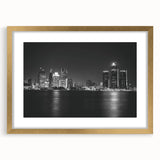 Extra large abstract art print of Detroit skyline in gold frame, featuring textured design with muted colors.