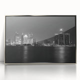 Mid-century modernist art of Detroit skyline in muted gray, acrylic print framed in silver.