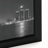 Framed canvas of Detroit skyline in black with colorful, textured brush strokes, ideal for large living room walls.