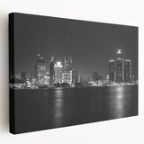 Large art depicting the Detroit skyline in muted blue and gray tones on stretched canvas, ideal for kitchen wall decor.