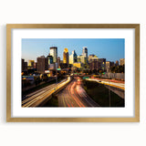 Abstract art print of Minneapolis skyline in textured style, using muted gray and blue tones on a large framed canvas.