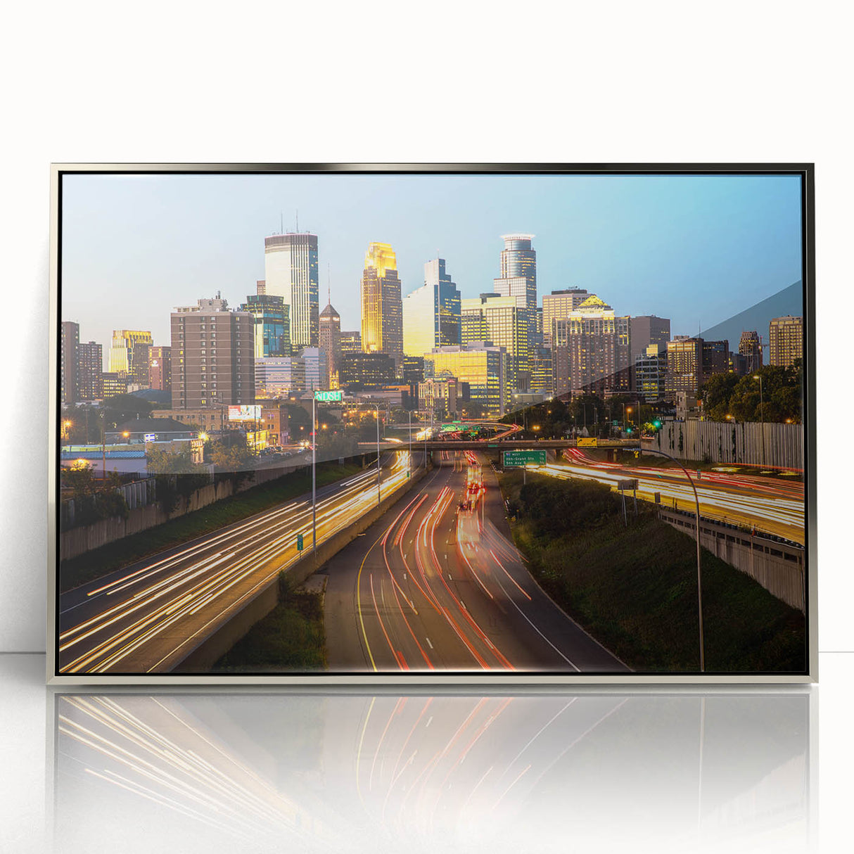 Mid-century modernist art of Minneapolis skyline in muted tones on a silver-framed acrylic print.