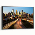 Black and white wall art featuring a vintage poster style landscape of Minneapolis on a framed canvas.