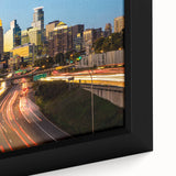Abstract art print of Minneapolis skyline in vibrant colors on a textured, framed canvas, ideal for living room decor.