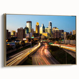 Framed canvas featuring a vintage-style landscape painting of Minneapolis in muted gold and black tones.