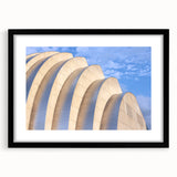 Extra large framed abstract art print depicting a colorful, textured Kansas City skyline, ideal for living room decor.
