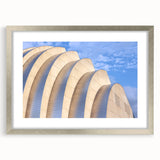 Textured abstract art print of Kansas City skyline in muted gray and silver tones on a framed canvas.