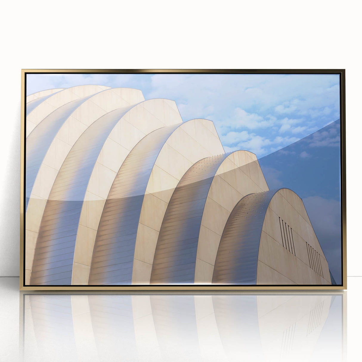 Acrylic print of Kansas City skyline in muted gold tones, framed, suitable for modern nursery decor.