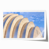 Rolled print of Kansas City skyline in muted gray and blue tones, ideal for art wall dining room decor.