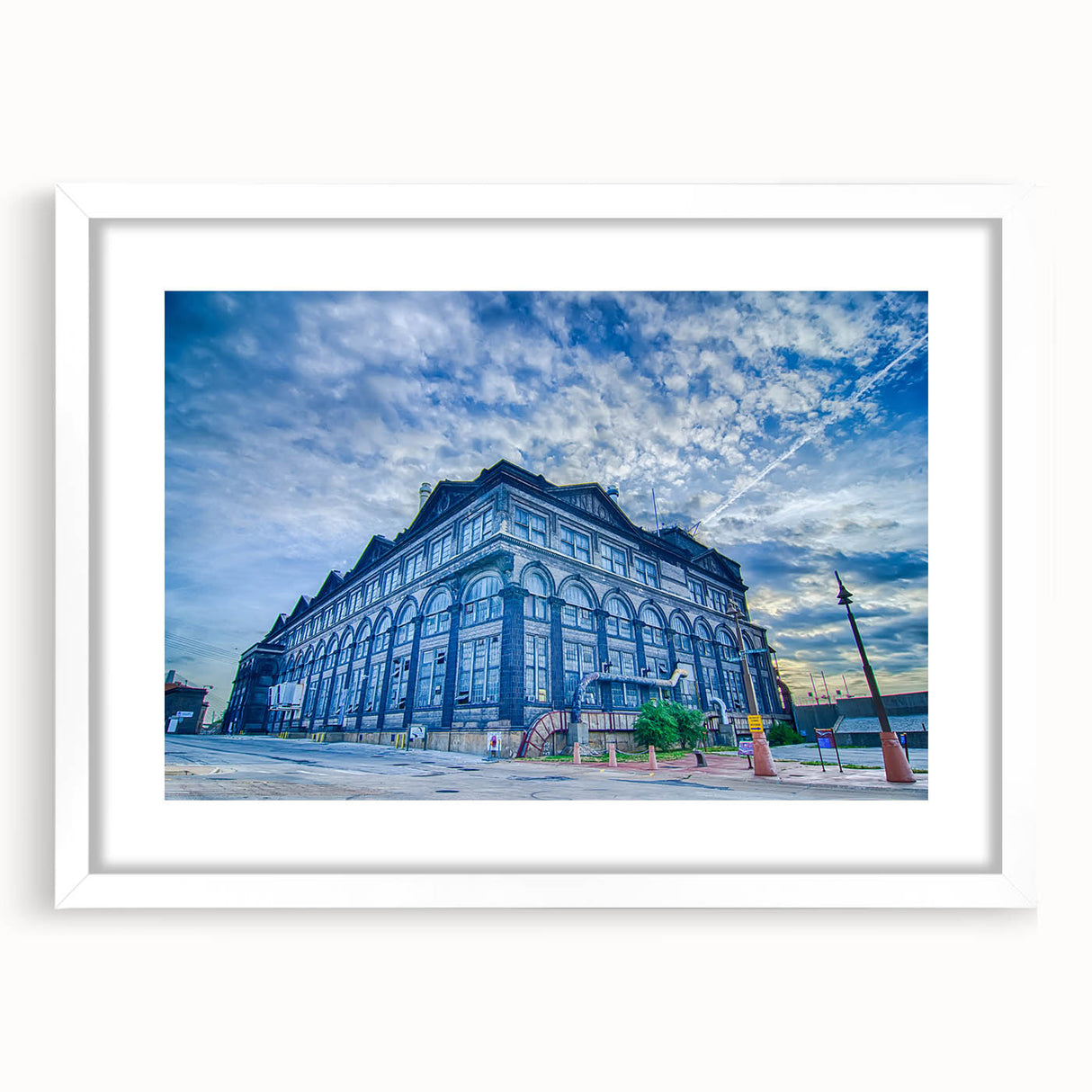 Abstract art print of St. Louis skyline in soft gray and blue tones on a white framed poster, ideal for dining room decor.