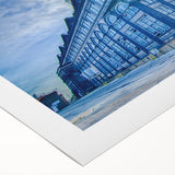 Art deco poster of St. Louis skyline in muted blue and gray tones on rolled canvas, ideal for dining room wall art.