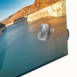 Mid-century modernist art of Hoover Dam in muted earth tones on large acrylic glass, suitable for dining room ambiance.