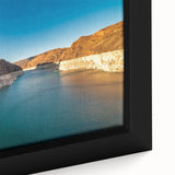 Close-up of black wall art featuring a textured depiction of Hoover Dam in a colorful, extra-large framed canvas.