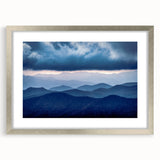 Textured art depicting the Blue Ridge Mountains in muted blue and green tones, framed in silver.