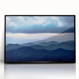 Large abstract wall art depicting the Blue Ridge Mountains in muted blues and greens on a framed acrylic.