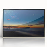 Mid-century modernist art of Cape Hatteras lighthouse in pastel hues on a silver-framed acrylic, ideal for nursery wall art.