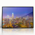 Large abstract wall art of Charlotte skyline in muted gray and blue tones on framed acrylic, ideal for modern office decor.