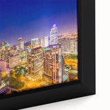 Extra large framed canvas of a textured, colorful Charlotte skyline on a black background, ideal for living room decor.