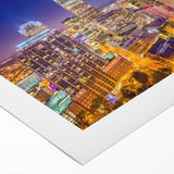 Art deco poster of Charlotte skyline in muted metallic tones on rolled canvas, suitable for dining room wall art.