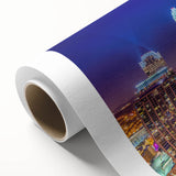 Art deco poster of Charlotte skyline in pastel shades on rolled canvas, ideal for nursery wall art.