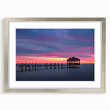 Textured abstract art print of the Outer Banks, featuring muted blue and gray tones on a framed silver mat.