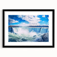 Extra large abstract art print of Niagara Falls in vibrant colors on a textured canvas, framed in black.
