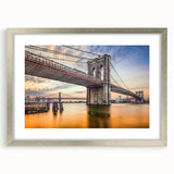 Textured art print of the Brooklyn Bridge in muted gray tones on a framed canvas, suitable for bedroom decor.