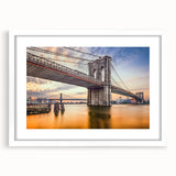 Abstract art print of the Brooklyn Bridge in grayscale tones, framed in white, suitable for bedroom or dining room decor.