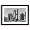 Abstract art print of the Chrysler Building in colorful, textured hues on a large black-framed canvas.