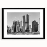 Abstract art print of the Chrysler Building in colorful, textured hues on a large black-framed canvas.