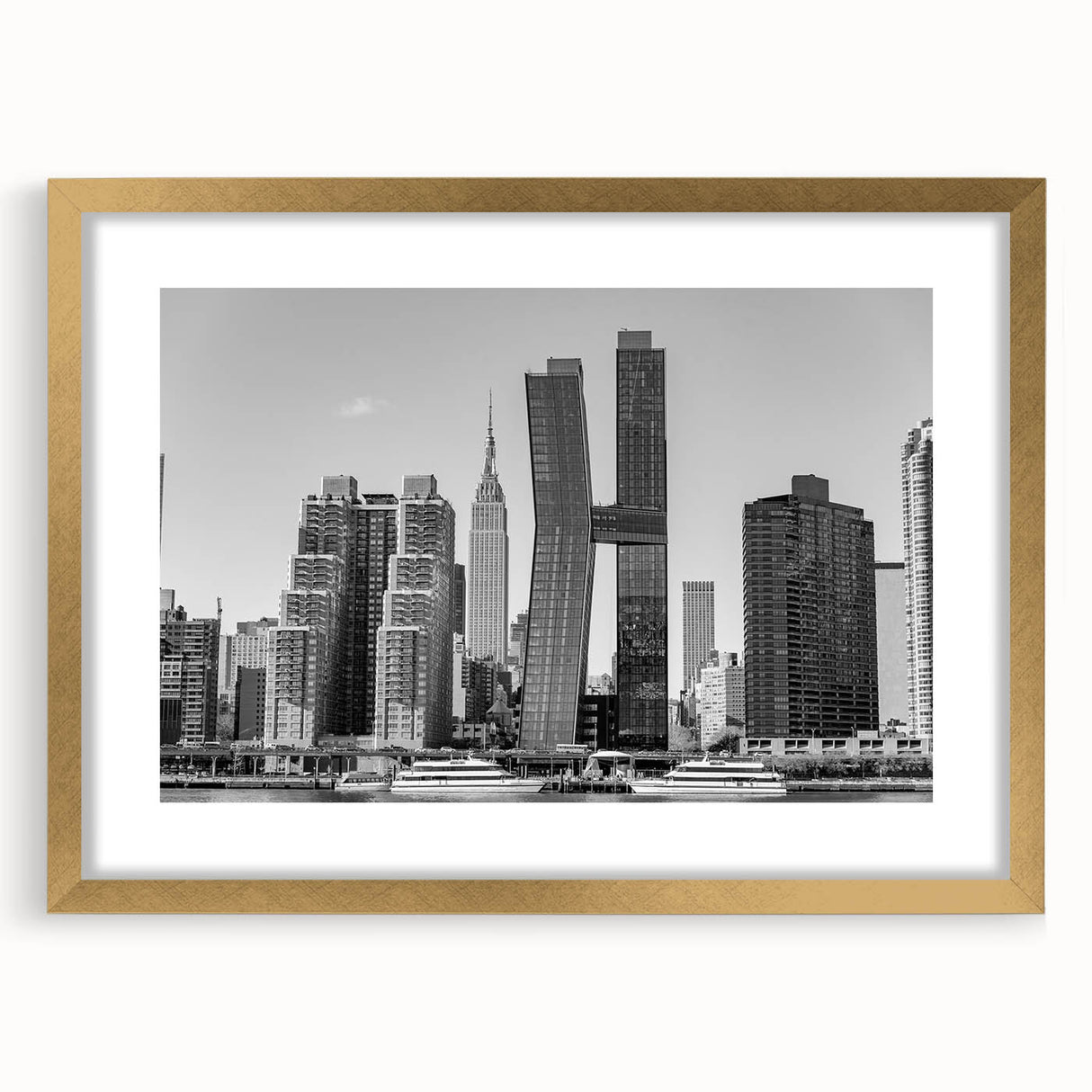 Extra large abstract art print featuring a textured depiction of the NYC Chrysler Building, in gold tones, framed with mat.