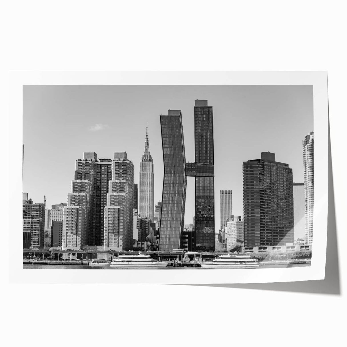 Art wall depicting the Chrysler Building in monochrome shades on a rolled print, suitable for dining room decor.