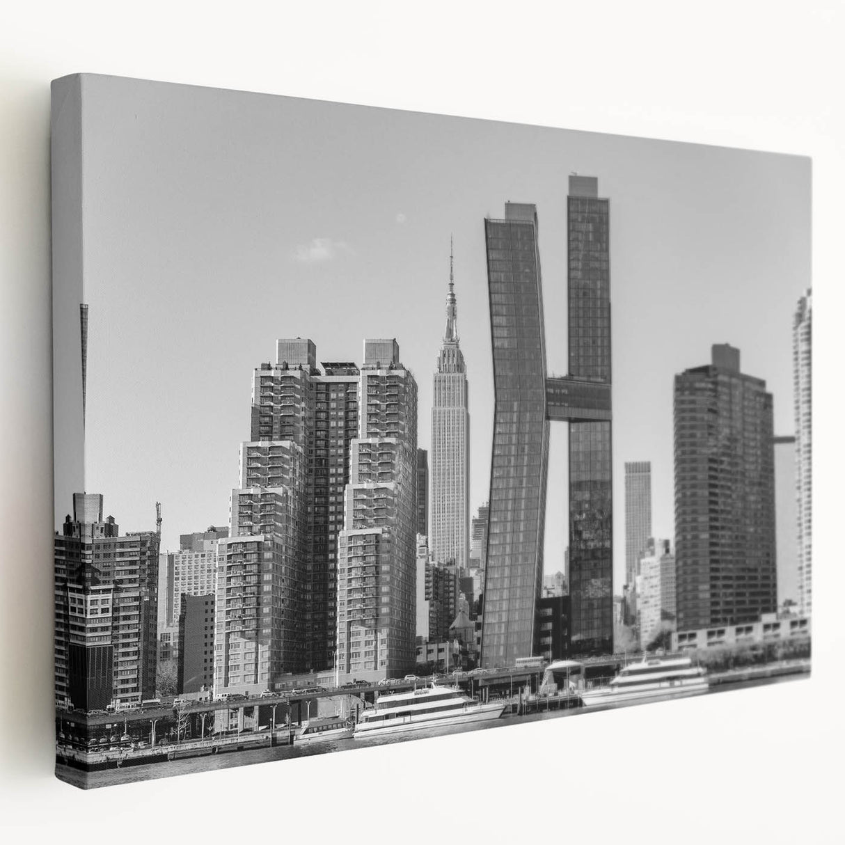 Side view of a large art print featuring the Chrysler Building in monochrome tones on stretched canvas.