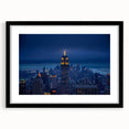 Abstract art print of NYC's Empire State Building in colorful, textured strokes on a large framed canvas.