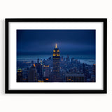 Abstract art print of NYC's Empire State Building in colorful, textured strokes on a large framed canvas.